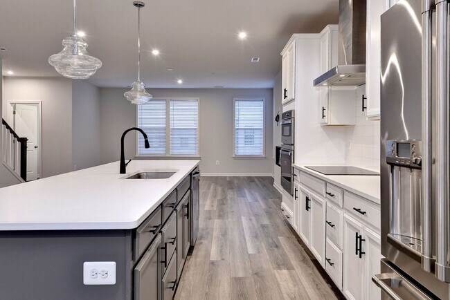 Building Photo - Three Story Brick End Unit with Rooftop Terrace