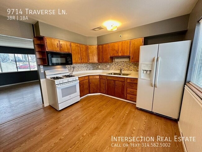 Building Photo - 9714 Traverse Ln