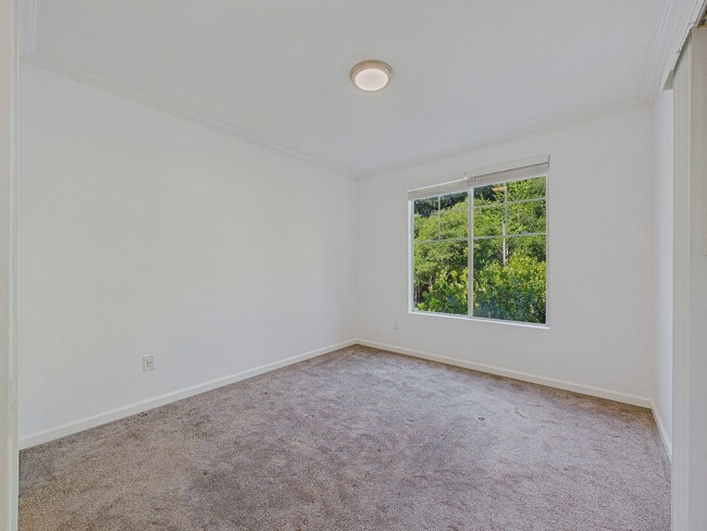 Building Photo - Stylish & Updated 1BD/1BA Condo in Secure Caldecott Community – Parking + In-Unit Laundry