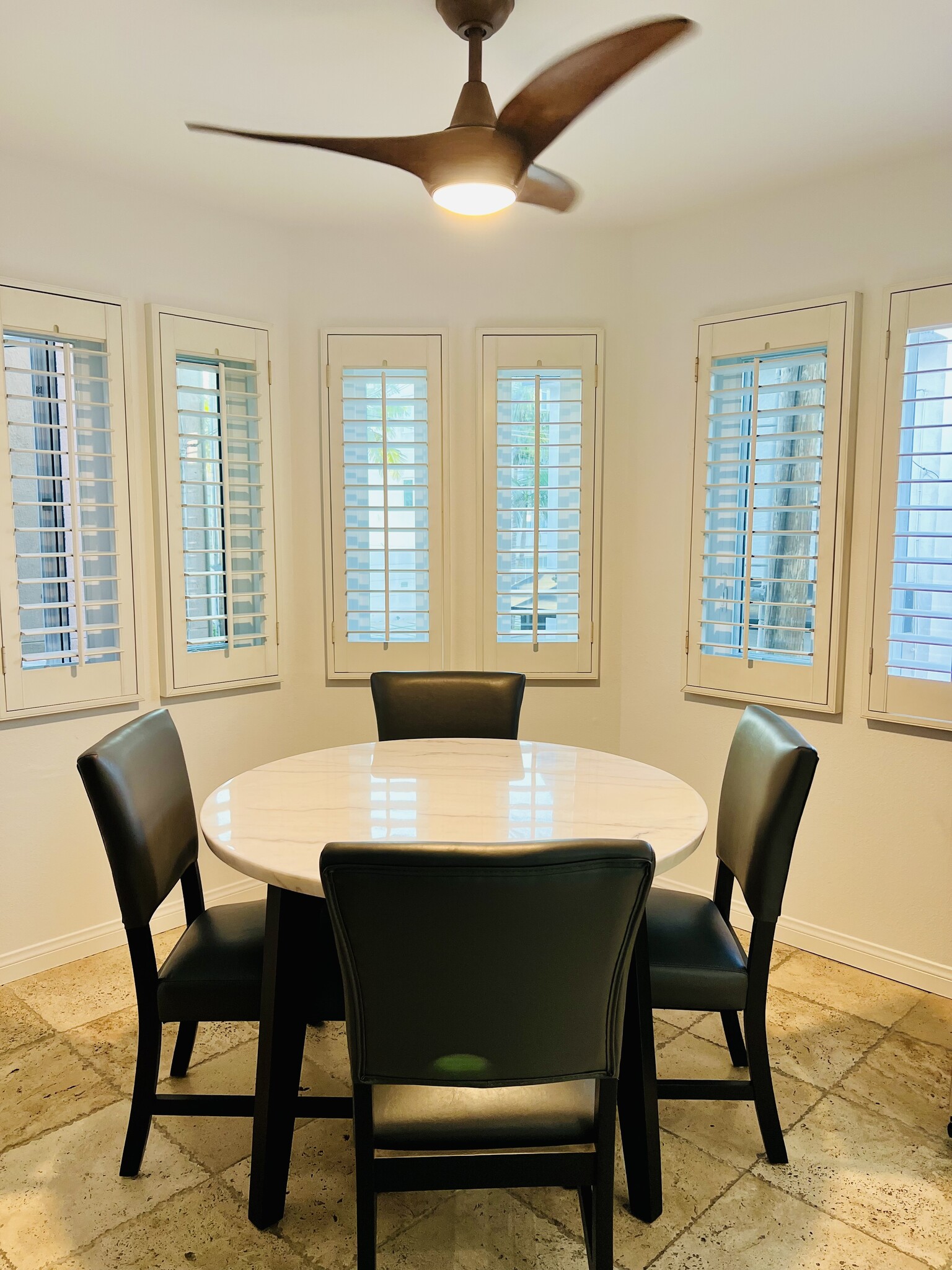 Dining area w marble table - 24 Westwind St