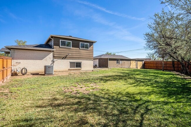 Building Photo - Spacious Home and a Hobbyist Dream w/Large...