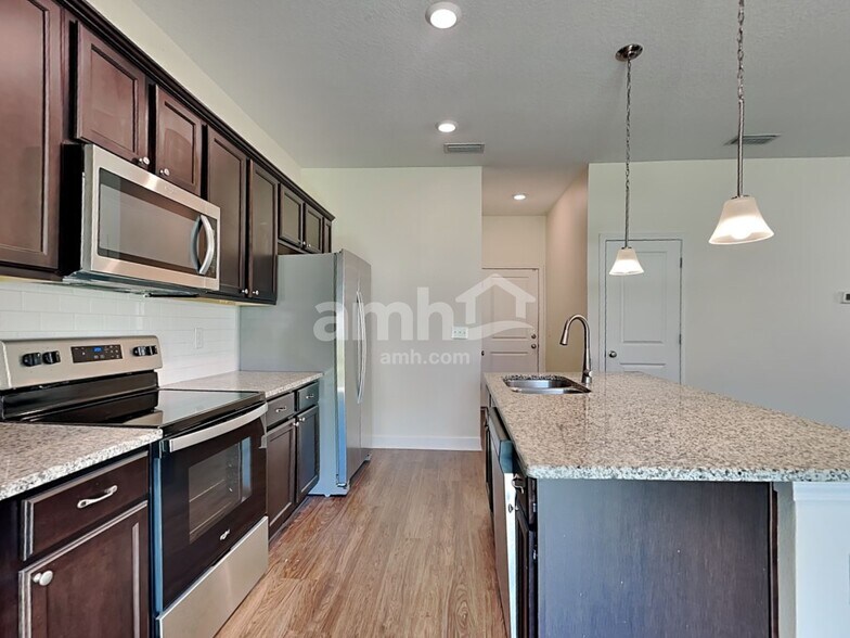 Building Photo - 6608 Hidden Rose Pl