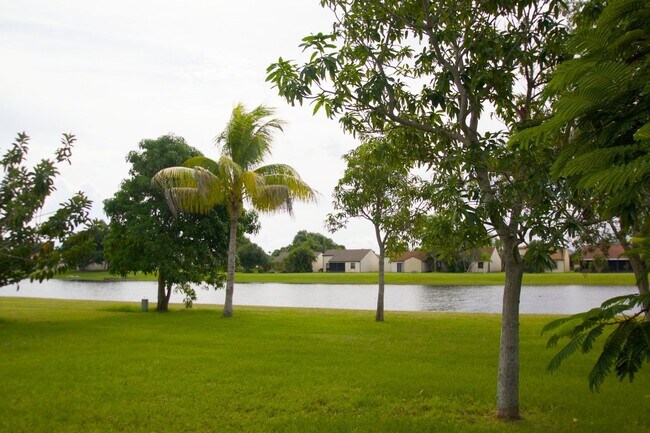 Building Photo - Waterfront 3BR Home on Canal | Spacious Yard | Lawn Care Included | Pet Friendly