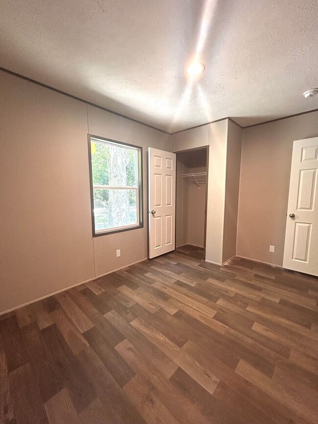 Building Photo - Brand new 4BR Mobile Home - Country living with City convenience!