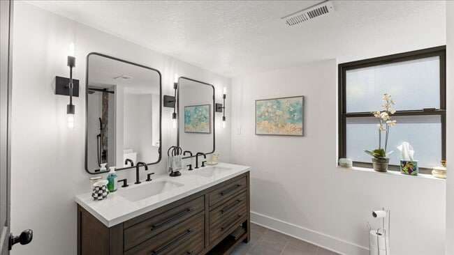Building Photo - Renovated Mid-Century Modern Home in Belmont West with Finished Basement & Fenced Yard
