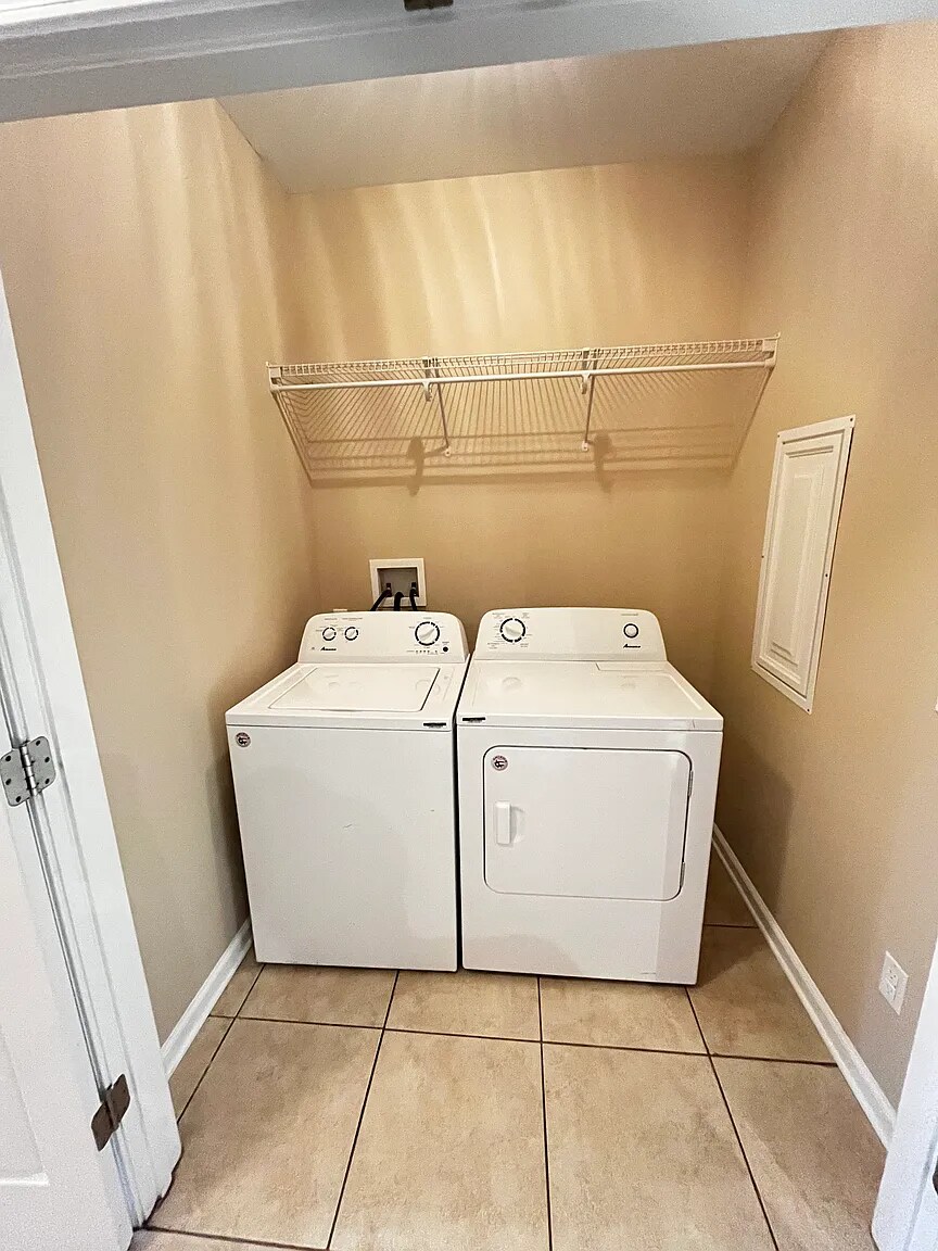 Washer and dryer located in hall closet - 103 Whitney Ave