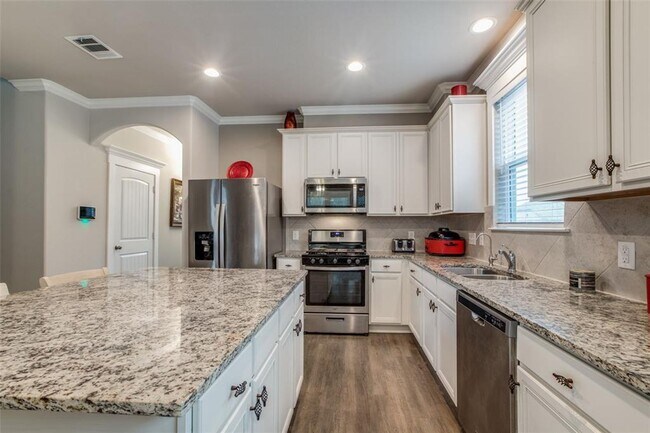 Building Photo - Looking for your first home or your forever home, the open floor plan on this beautiful home in t...