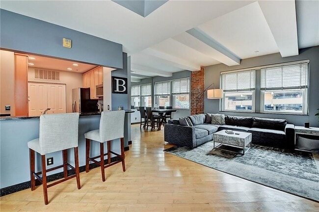 Kitchen only slightly tucked away which allows for hosts to actually host - 110 E Washington St