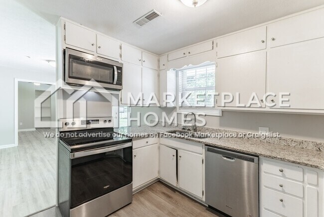 Building Photo - 6517 Marsh Ave NW