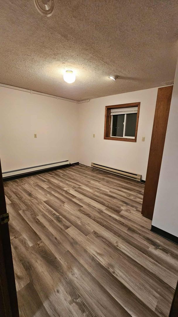 Building Photo - Beautiful House with 2 Wood Stoves across from park in Kalispell