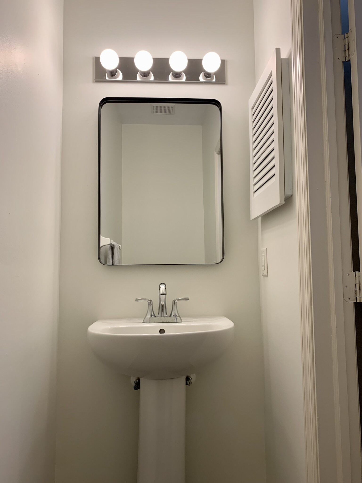 1st floor half bath - 6116 Inishmore Ln