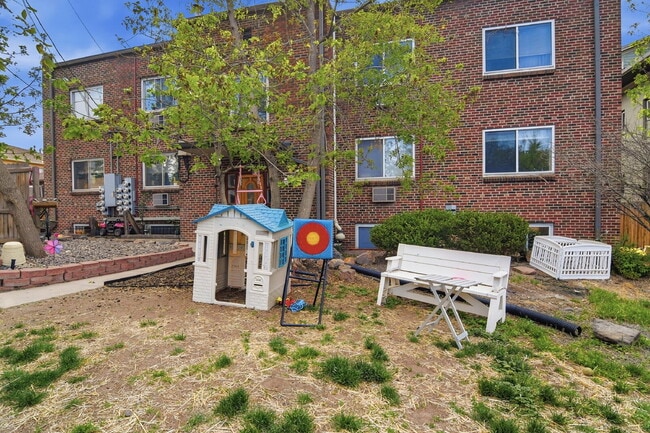 Building Photo - $1,345.95, 1 Beds - 1 Bath, Condo in Denver with Onsite Laundry!