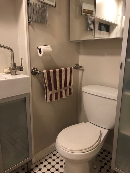 Full bath with shower and linen cabinet - 2 Emmons Pl