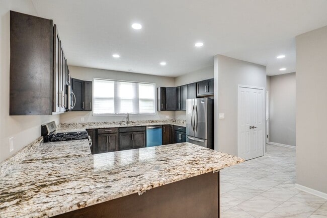 Building Photo - Brand-New 3-Bed, 2.5-Bath Condo: Modern Co...