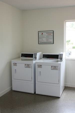 Laundry Room - The Landings Apartment Homes