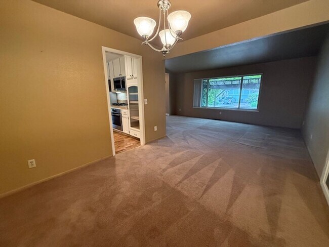 Building Photo - OPEN HOUSE this Wednesday 5pm-6:30pm - Private Redwood Setting | 4BR Home with Family Room, Bar &...