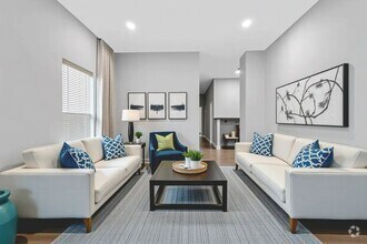 Building Photo - Renovated and full of character, this 3-be...