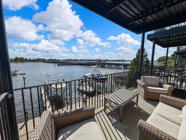 Building Photo - Fully Furnished Waterfront Elegance on Mai...