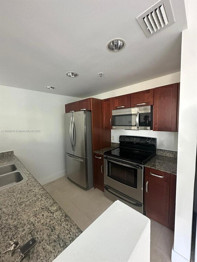 Building Photo - 7728 Collins Ave