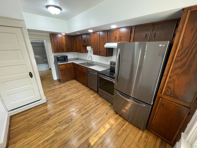 Building Photo - New Appliances + HUGE Fenced Backyard