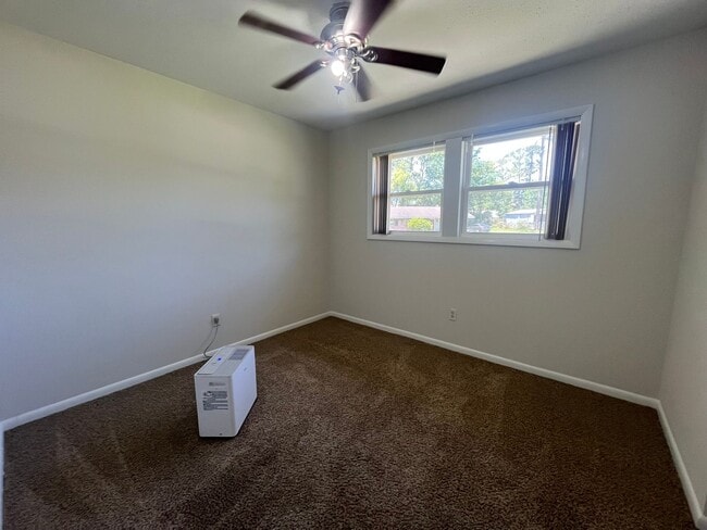 Building Photo - Charming 4-Bedroom Brick Home on Spacious ...