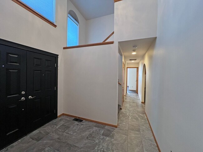 Building Photo - Stunning 4 Bedroom 2.5 Bath with Peek-a-Boo View of Puget Sound