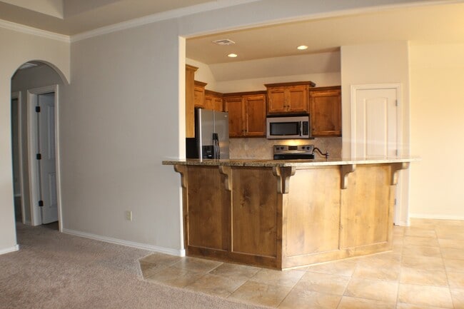 Building Photo - Bixby home available now!
