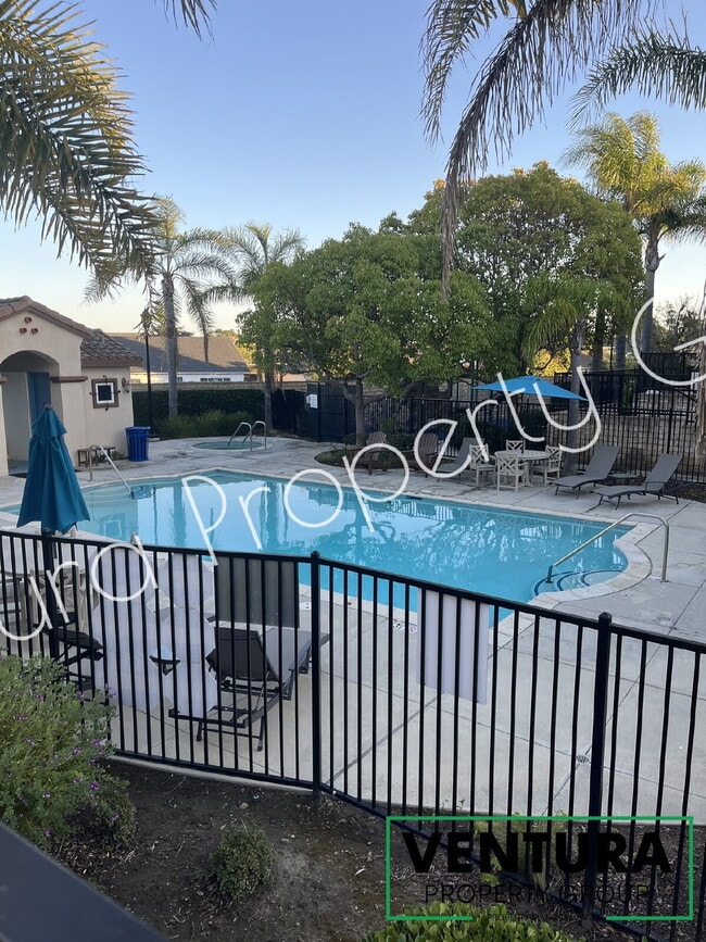 Building Photo - Spacious 4-Bed, 3-Bath Townhouse Retreat at The Gated Community at the Cottages