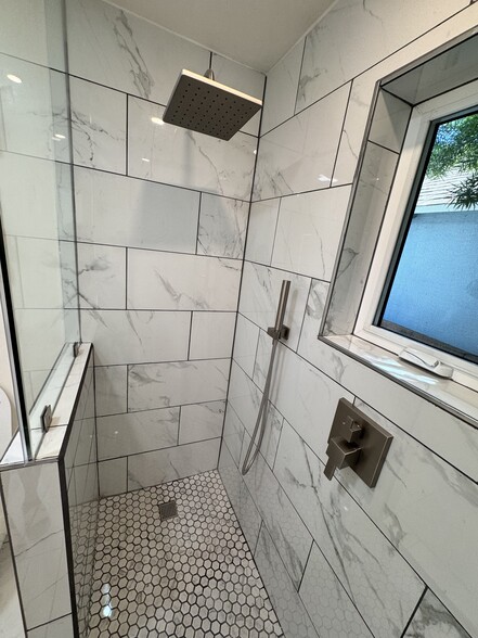 Custom shower with multiple shower heads - 7364 W 83rd St