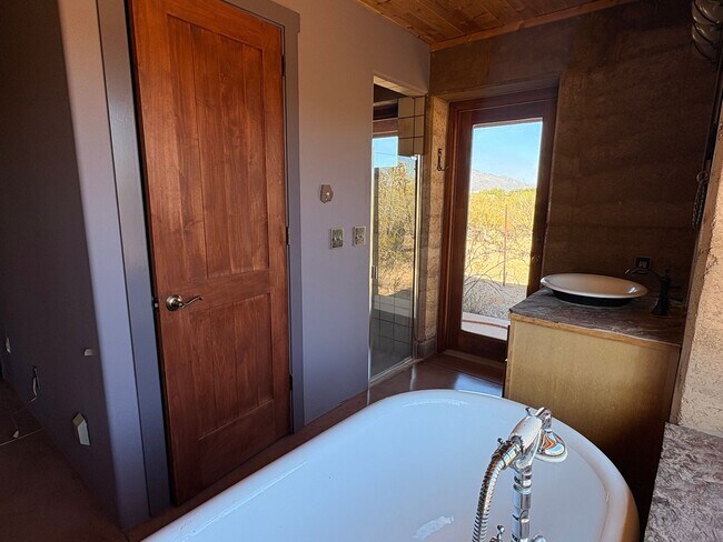 Building Photo - Desert Home on 3.3 Acres with Rooftop Views & Unique Rammed Earth Design