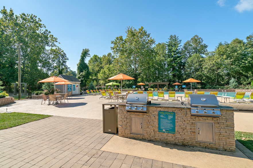 Grill your favorite by the pool with Hawthorne at Southside's outdoor grilling station - Hawthorne at Southside