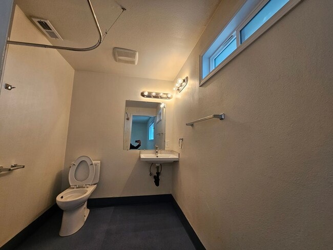 Building Photo - Charming Single-Level Home Featuring New Hardwood Floors, Bright Bedrooms & Open-Concept Living