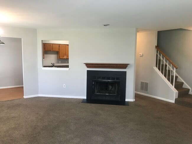 Living Room Fireplace - 9304 Player Dr