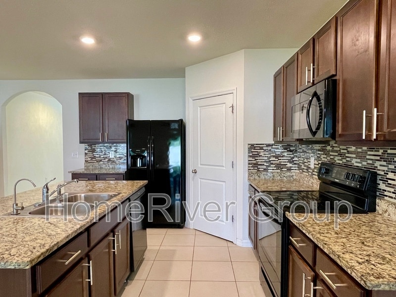 Building Photo - 9232 Watolla Dr