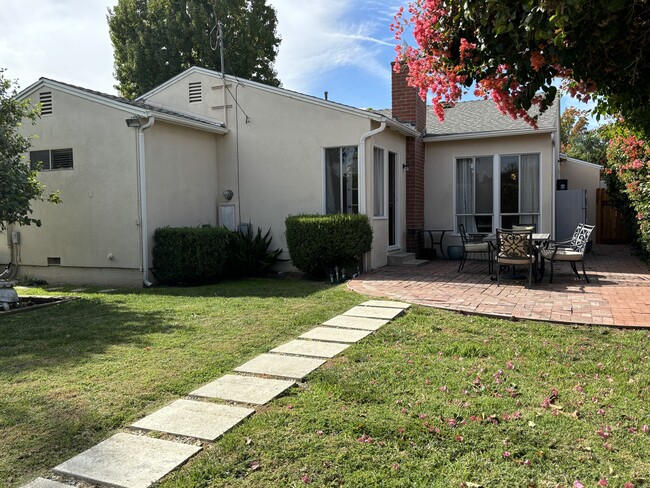 Backyard detail with patio - 5450 Burnet Ave