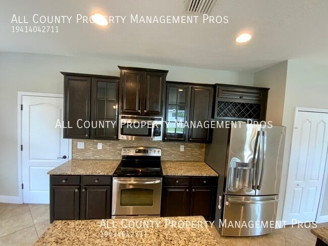 Building Photo - 5440 Mang Pl