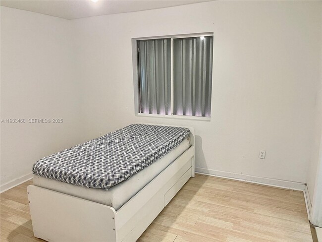 Building Photo - 5857 NW 13th Ave