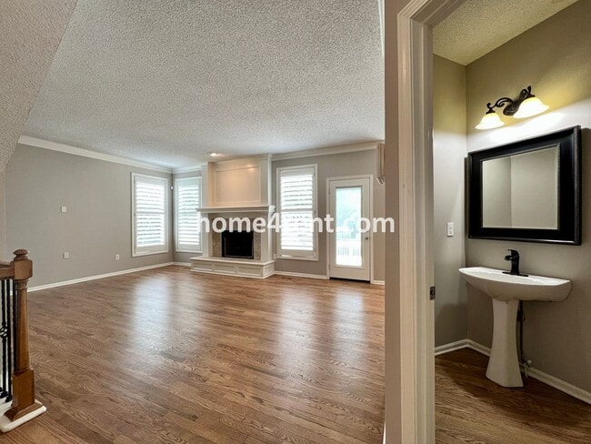 Building Photo - Updated Kitchen, Large Two Tiered Deck, Finished Basement in Blue Valley Schools!
