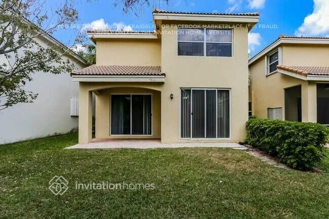 Building Photo - 10642 NW 1st Ct