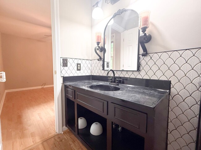 Building Photo - Spacious 3-Bedroom Home with Screened Porch, 2-Car Garage + Workshop