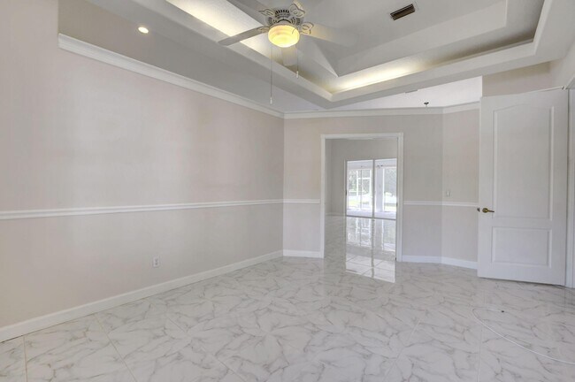 Building Photo - 8028 Plantation Lakes Dr