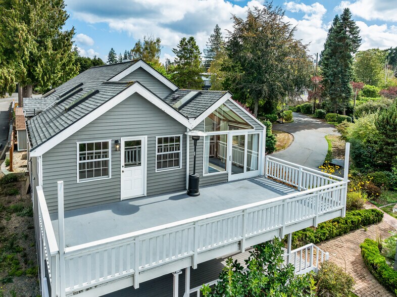 Large deck with sunroom on the left - 22224 98th Ave W