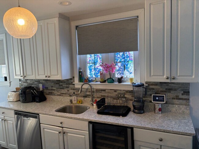 Building Photo - Elegant 3 Story Brick Corner Property Now Available