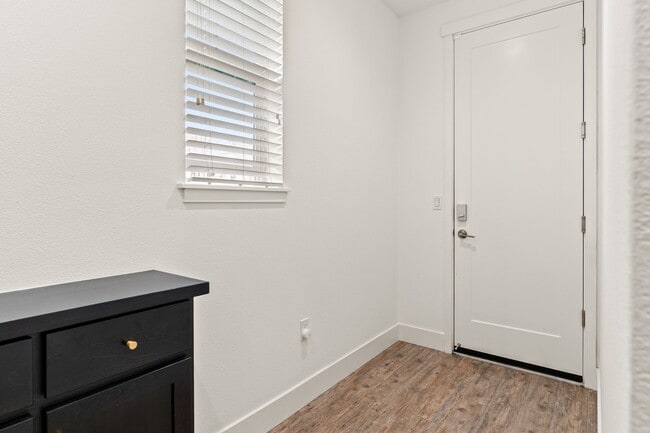 Building Photo - Sun-Filled Corner 4BR w/ Dual Yards & Panoramic Indoor-Outdoor Flow