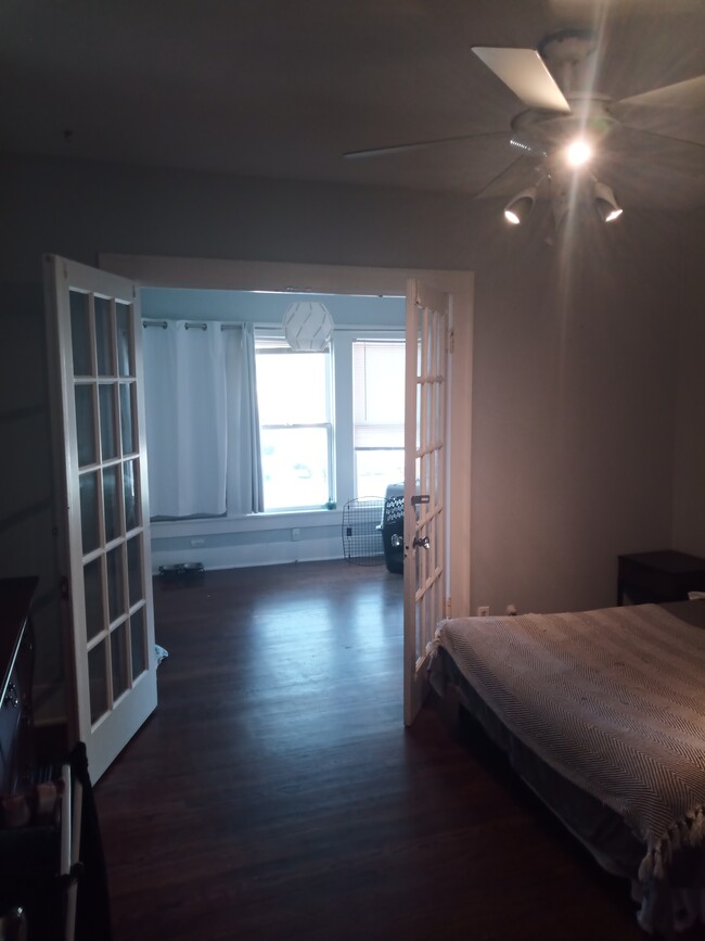 French doors open up to another bedroom or home office - 1539 Westheimer Rd