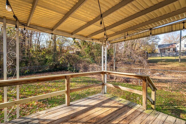 Building Photo - NE Home - Updated Kitchen and Bathrooms!  SS Appliances, Fire Place, Front Porch & Deck, Fenced Y...