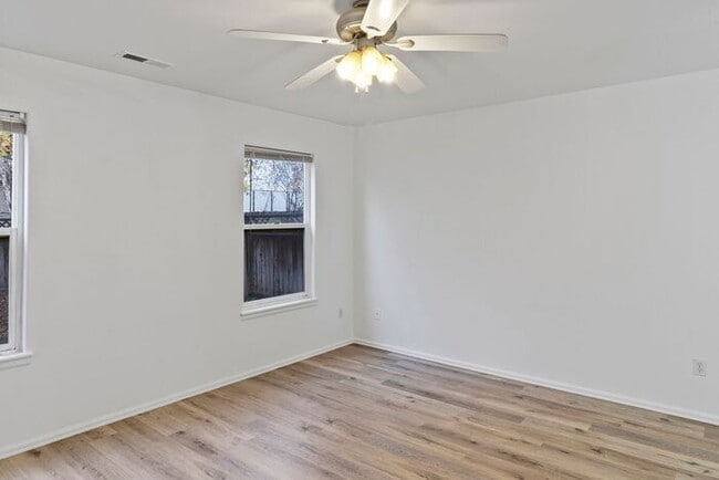 Building Photo - Wonderful 3 Bedroom Home with New Flooring and Paint