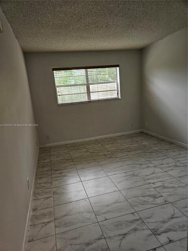 Building Photo - 11131 Royal Palm Blvd