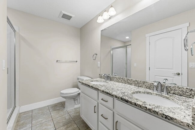 Building Photo - Upgraded 4-Bed Townhome with Finished Base...