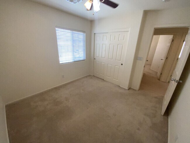 Building Photo - 4 bedrooms and 2.5 bathrooms 2-story home located in Henderson, NV!